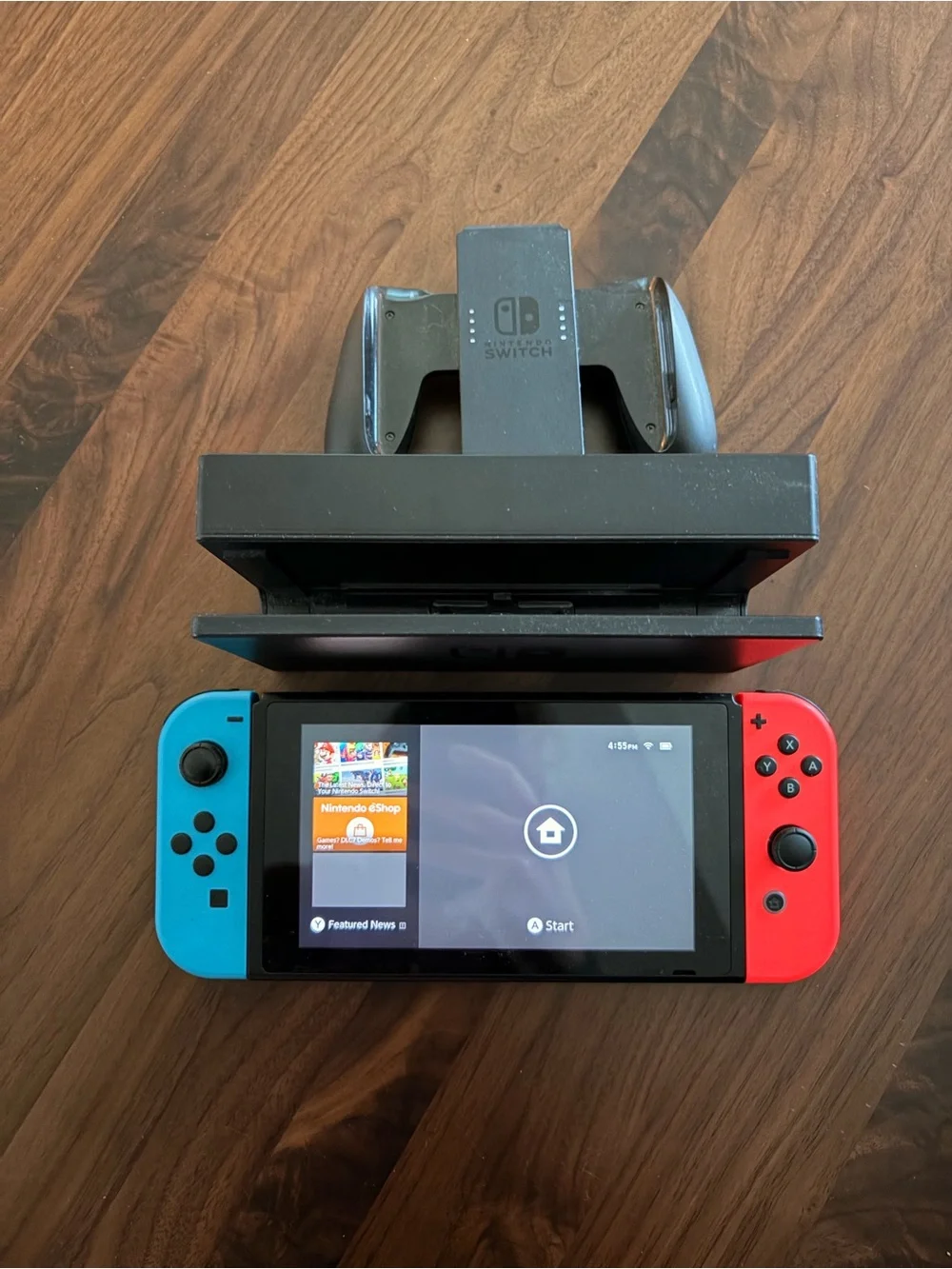 Nintendo Switch with Neon Blue Left Joy‑Con & Neon Red Right Joy‑Con